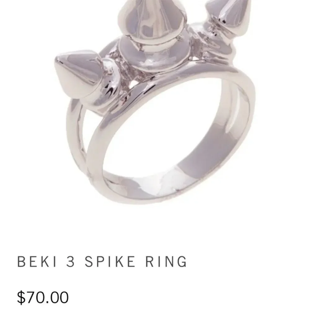nOir jewelry collection of NYC goldtone Beki 3 spike ring size 8